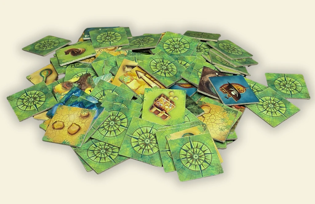 Terra Incognita modular pirate board game island tiles showing jungle and secret coves.